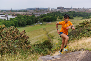 Allie Bailey running in inov-8 shoes.