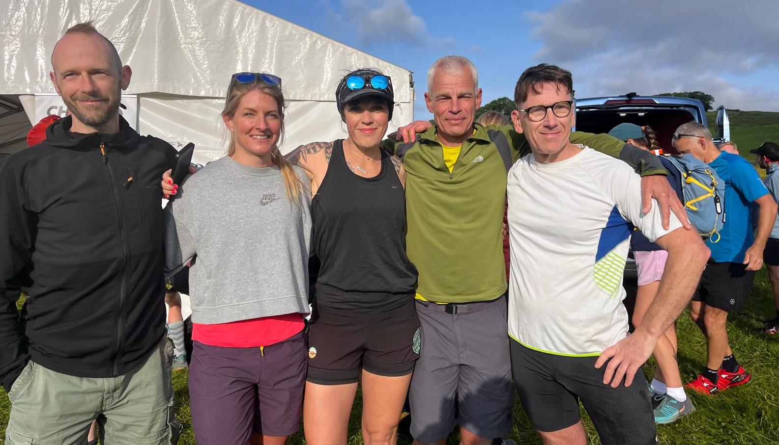 Allie Bailey, Damian Hall and Vertebrate MD Jon Barton after the Montane Summer Spine Challenger North 2025