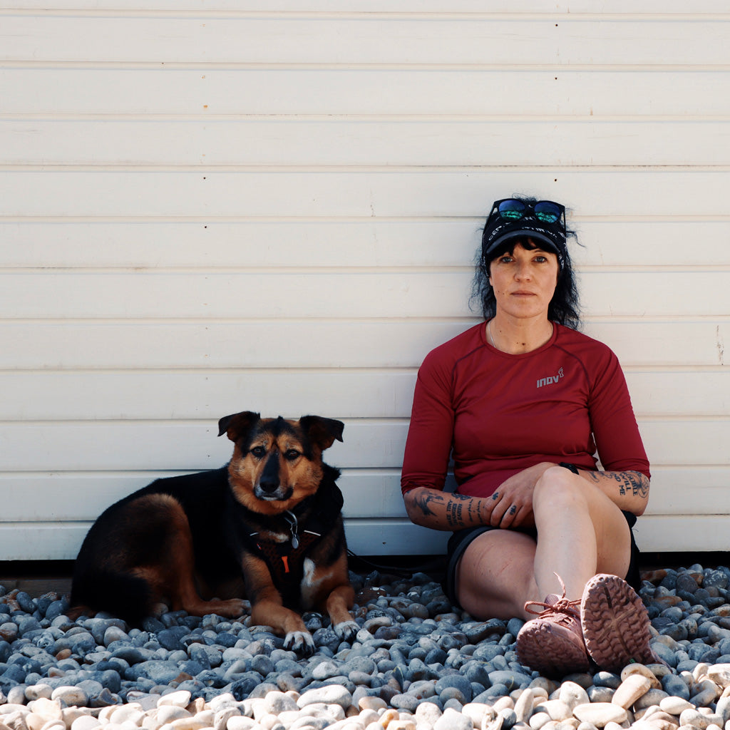 Allie Bailey, author of 31 Days, a zero-bullshit maserclass in mindset training for the modern runner, with her dog Pickle. Photo by David Miller