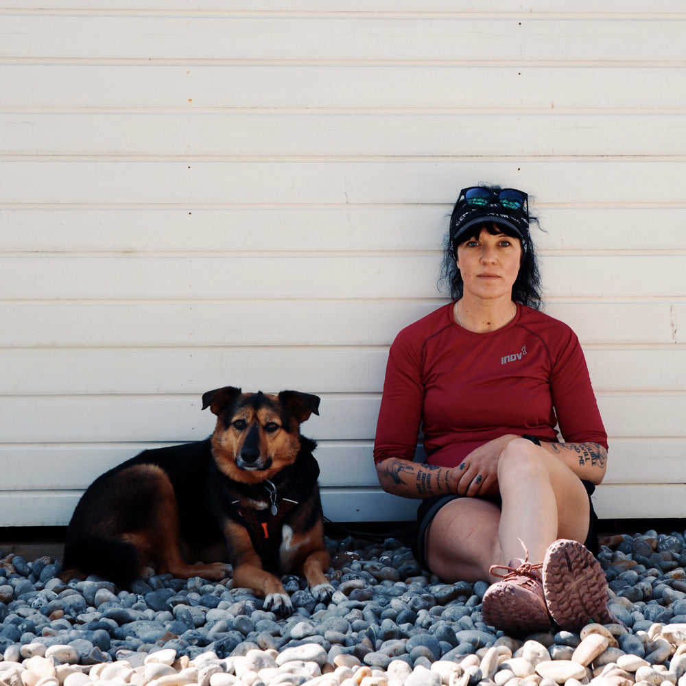 Ultrarunner Allie Bailey, author of There is No Wall, with her dog Pickle. Photo by David Miller