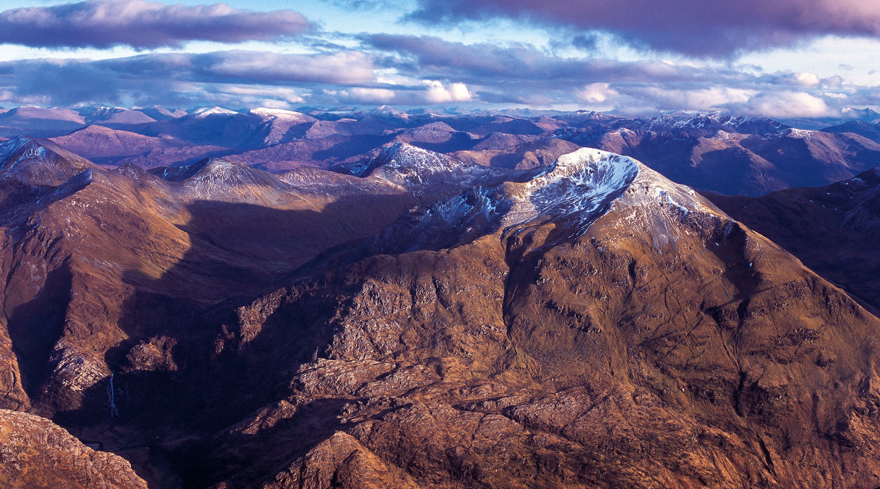 Sgurr a' Mhaim from Ben Nevis by Craig Aitchison (www.landandlight.co.uk), taken from the cover of Peak Bagging Munros Volume 1 by Nicola Hardy